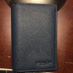 Coach Men's card wallet blue denim in color